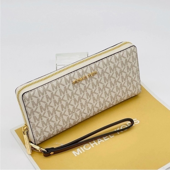 Michael Kors Large Continental Wallet
Wristlet Vanilla/Brown - Picture 4 of 9